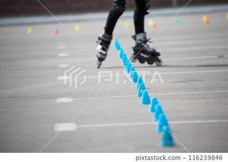 Competitions in roller sport.Roller skates and special chips Competitions in roller sport.Roller skates and special chips 116239846