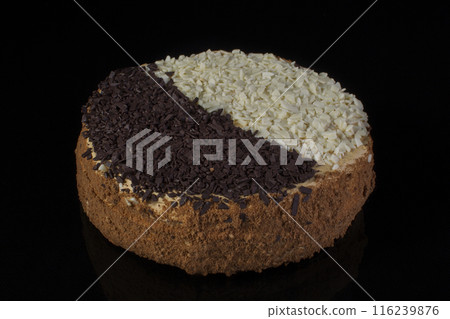 Cake with white and black chocolate on a black background.Russian cake day and night Cake with white and black chocolate on a black background.Russian cake day and night 116239876