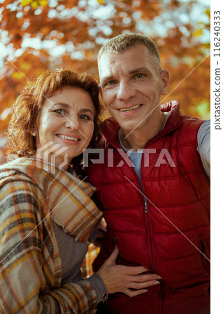 happy modern couple in park taking selfie happy modern couple in park taking selfie 116240333