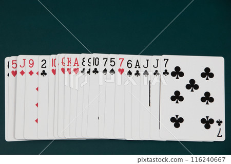 Playing cards on a dark background, games of chance 116240667