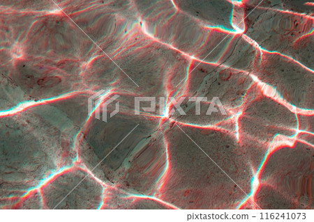 Sun glare on the water in the fountain with an old stone floor, unusual abstract texture 116241073