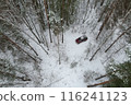 Aerial View of SUV in snowy Forest 116241123