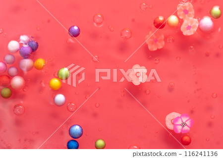 Colorful gel texture, clear skincare cream with bubbles and decorative figurines background, transparent beauty serum, colored cosmetic product close up Colorful gel texture, clear skincare cream with bubbles and decorative figurines background, transparent beauty serum, colored cosmetic product close up 116241136