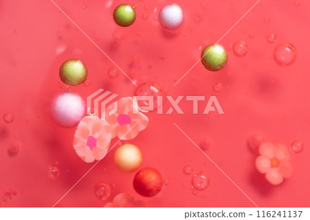 Colorful gel texture, clear skincare cream with bubbles and decorative figurines background, transparent beauty serum, colored cosmetic product close up Colorful gel texture, clear skincare cream with bubbles and decorative figurines background, transparent beauty serum, colored cosmetic product close up 116241137