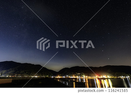 Autumn starry sky in Setouchi. The Big Dipper rising in the northern sky. The constellation Cassiopeia setting. 116241585