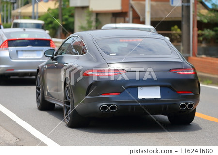 Image of a sports car running in the city 116241680