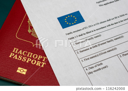 Russian travel passport with Schengen visa application form, sanctions, emigration, immigration, tourism concept 116242008