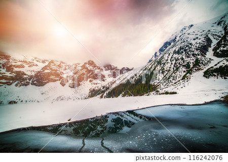 Frozen Lake Morskie Oko or Sea Eye Lake in Poland at Winter. Frozen Lake Morskie Oko or Sea Eye Lake in Poland at Winter. 116242076