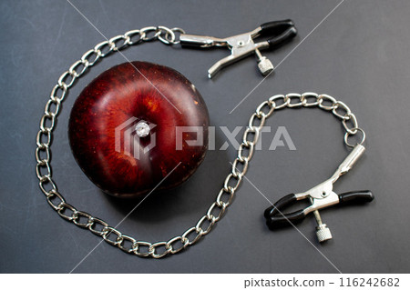 Anal sex concept, anal plug on a black... - Stock Photo [116242682]