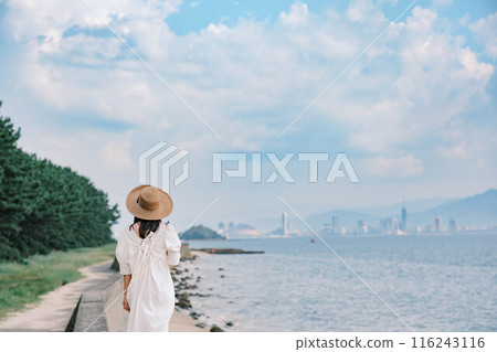 Young woman enjoying the sea Young woman enjoying the sea 116243116