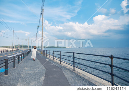 Young woman enjoying the sea Young woman enjoying the sea 116243154