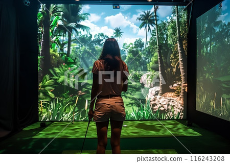 Golf simulator. Golfer playing golf in indoor simulator 116243208
