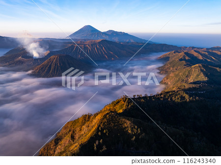 Aerial view Mountains at Bromo volcano during sunrise sky,Beautiful Mountains Penanjakan in Bromo Tengger Semeru National Park,East Java,Indonesia.Nature landscape background 116243340