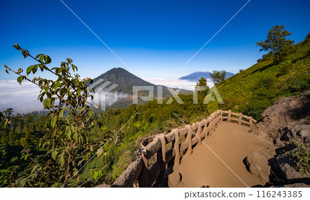 Beautiful landscape view Mountains with fog in sunrise sky at Indonesia 116243385