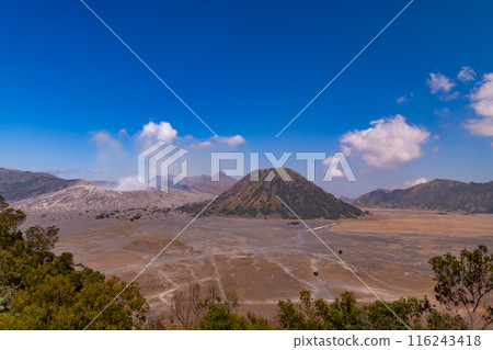 Aerial view Mountains at Bromo volcano during sunrise sky,Beautiful Mountains Penanjakan in Bromo Tengger Semeru National Park,East Java,Indonesia.Nature landscape background 116243418