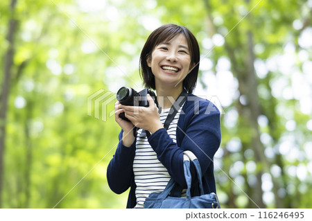 A woman taking a picture A woman taking a picture 116246495