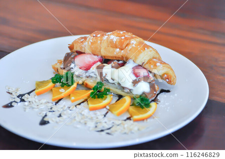 ice cream stuffed croissant or croissant with ice cream stuffed or Vanilla Custard Filled Croissant ice cream stuffed croissant or croissant with ice cream stuffed or Vanilla Custard Filled Croissant 116246829