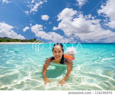Summer vacation image: Woman playing in the clear sea Summer vacation image: Woman playing in the clear sea 116246970