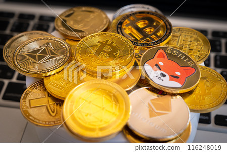 Close up of various kinds of Cryptocurrency token coins. Cryptocurrency is a digital or virtual currency that is secured by cryptography. Close up of various kinds of Cryptocurrency token coins. Cryptocurrency is a digital or virtual currency that is secured by cryptography. 116248019