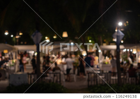 abstract blurred festival food market night light bokeh background. People walking travel street food and stalls 116249138