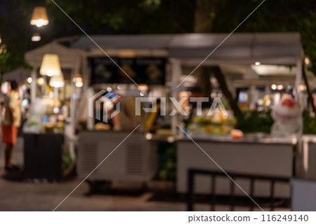 abstract blurred festival food market night light bokeh background. People walking travel street food and stalls 116249140