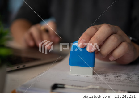 Contract law or paper work business and finance document rubber stamp. For official and legal contracts and agreements, financial statements, investment contracts, real estate documents. 116249251