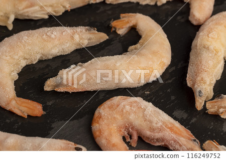 semi-finished product of heavily frozen red shrimps semi-finished product of heavily frozen red shrimps 116249752