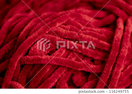 new soft red threads with traces of other threads in close-up new soft red threads with traces of other threads in close-up 116249755