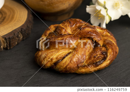 braided fresh bun for tea on the table 116249759