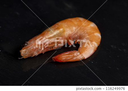 semi-finished product of heavily frozen red shrimps semi-finished product of heavily frozen red shrimps 116249976