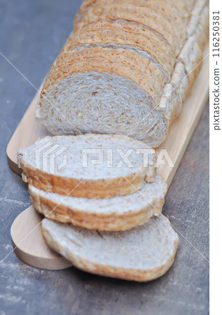 bread , whole wheat bread or sourdough bread or loaf of bread or cranberry and whole grain bread 116250381