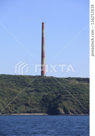 The second large chimney of the Saganoseki refinery as seen from a ship The second large chimney of the Saganoseki refinery as seen from a ship 116252816