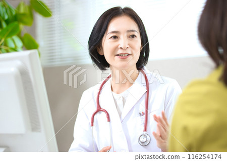 Middle-aged female doctor to see 116254174