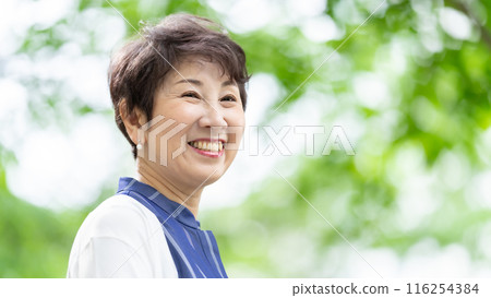 Senior woman fresh green portrait 116254384