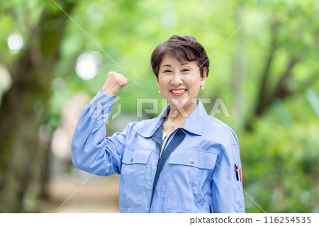 Woman in work clothes, fresh green portrait 116254535