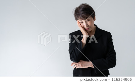 Senior woman mourning dress portrait Senior woman mourning dress portrait 116254906