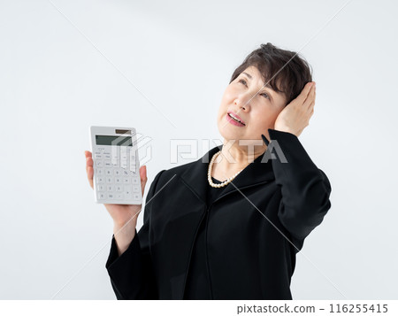 Woman in mourning dress calculator money 116255415