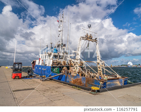 Cutter berthed at the port Cutter berthed at the port 116257791