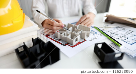 Architect shows layout of house or apartment closeup 116258090