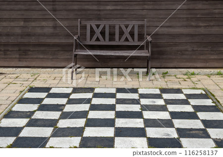 Chessboard and a bench outdoors, Podolie, Slovakia Chessboard and a bench outdoors, Podolie, Slovakia 116258137