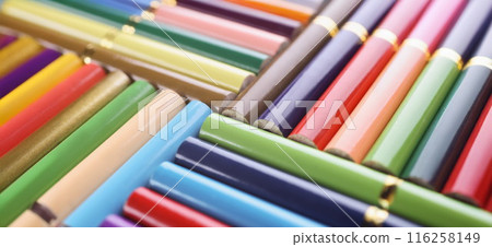Bunch of colored pencils placed in creative order close to each other 116258149