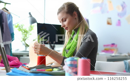 Talented lady have ideas for collection, album full with sketches, professional atelier Talented lady have ideas for collection, album full with sketches, professional atelier 116258255