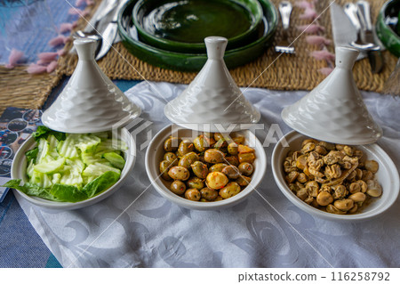 Exquisite Moroccan Lunch with Vegetable Tagines. 116258792