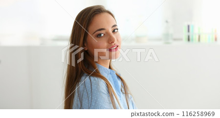 Attractive brunette young woman, lady posing in office, professional model 116258969