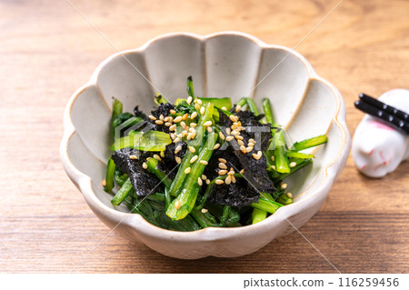 Chrysanthemum greens tossed in seaweed Chrysanthemum greens tossed in seaweed 116259456
