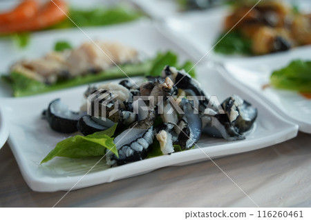 Sea cucumber raw fish, called wild ginseng of the sea, is enjoyed in Asian countries including Korea Sea cucumber raw fish, called wild ginseng of the sea, is enjoyed in Asian countries including Korea 116260461