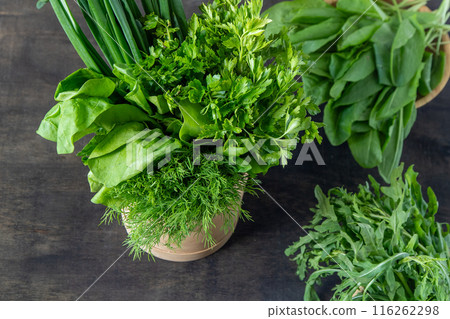 Green onions, spinach, parsley and dill. Vitamin food. Prepare greens for salad. 116262298