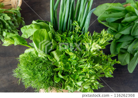 Green onions, spinach, parsley and dill. Vitamin food. Prepare greens for salad. 116262308
