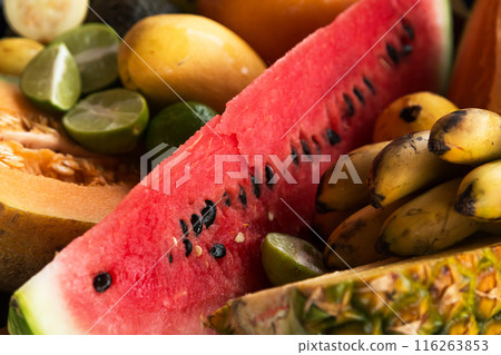 Closeup of different sweet fruits in bowl 116263853
