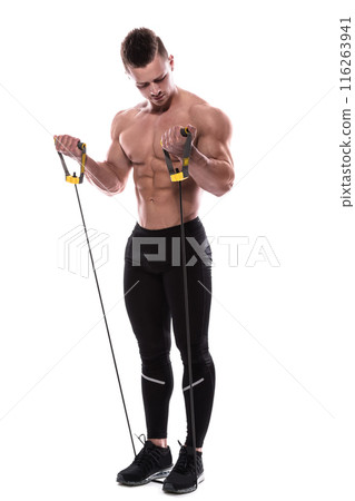 Bodybuilder working out with rubber band over white background Bodybuilder working out with rubber band over white background 116263941